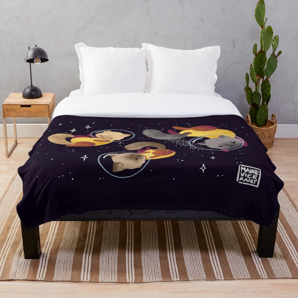 Cute space cats illustration on a pastel plush blanket