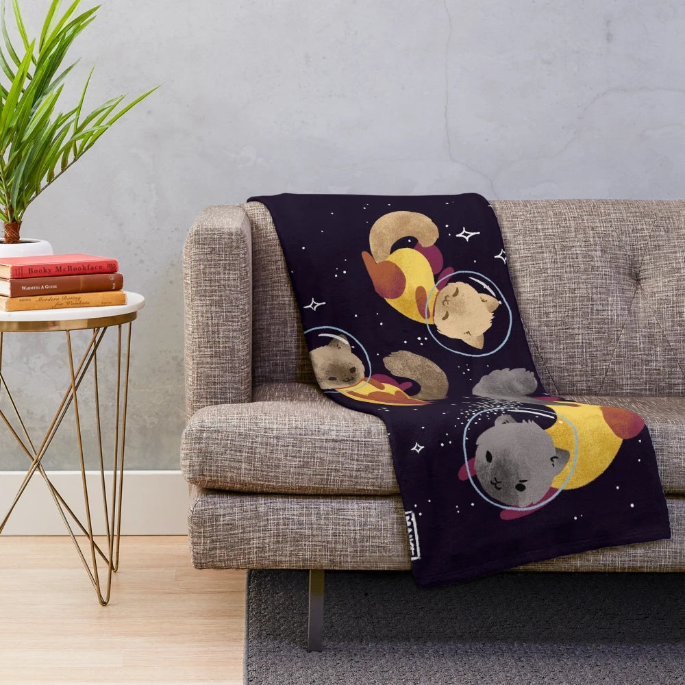 Cute space cats illustration on a pastel plush blanket