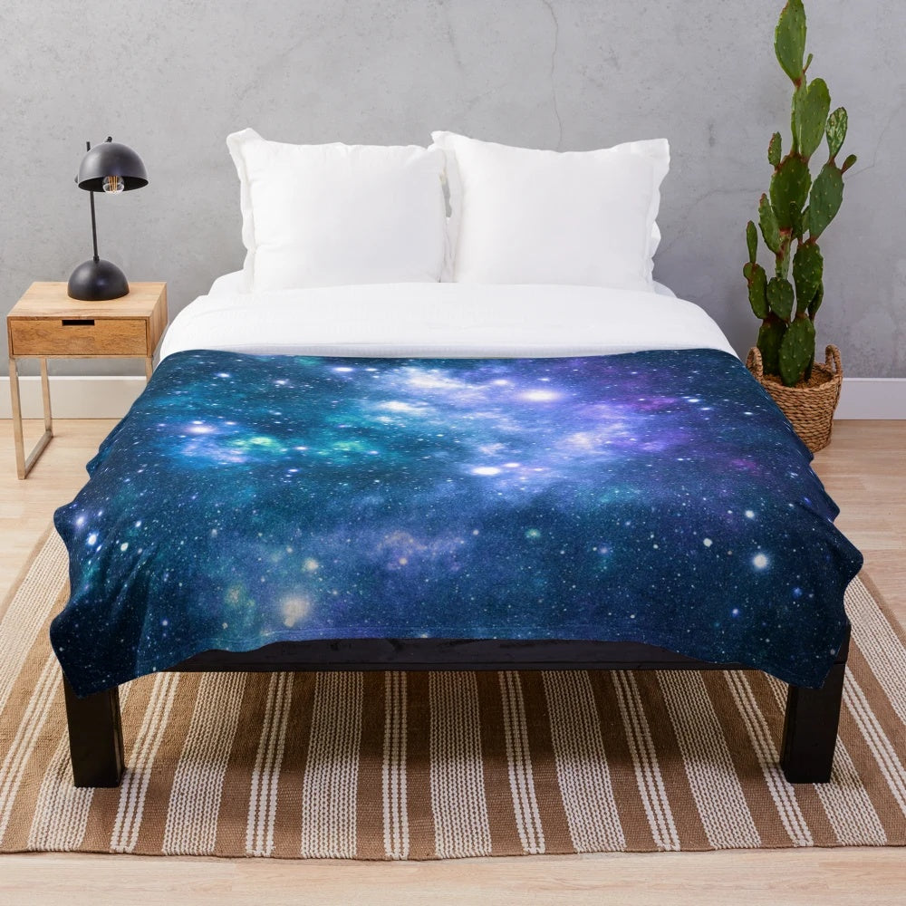Turquoise, teal, and purple galaxy nebula print plush blanket
