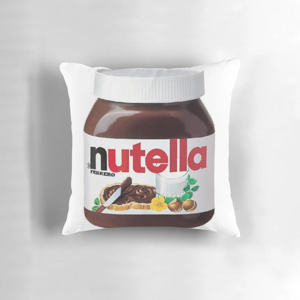 Vibrant and whimsical space-themed pillow with a playful Nutella-inspired design