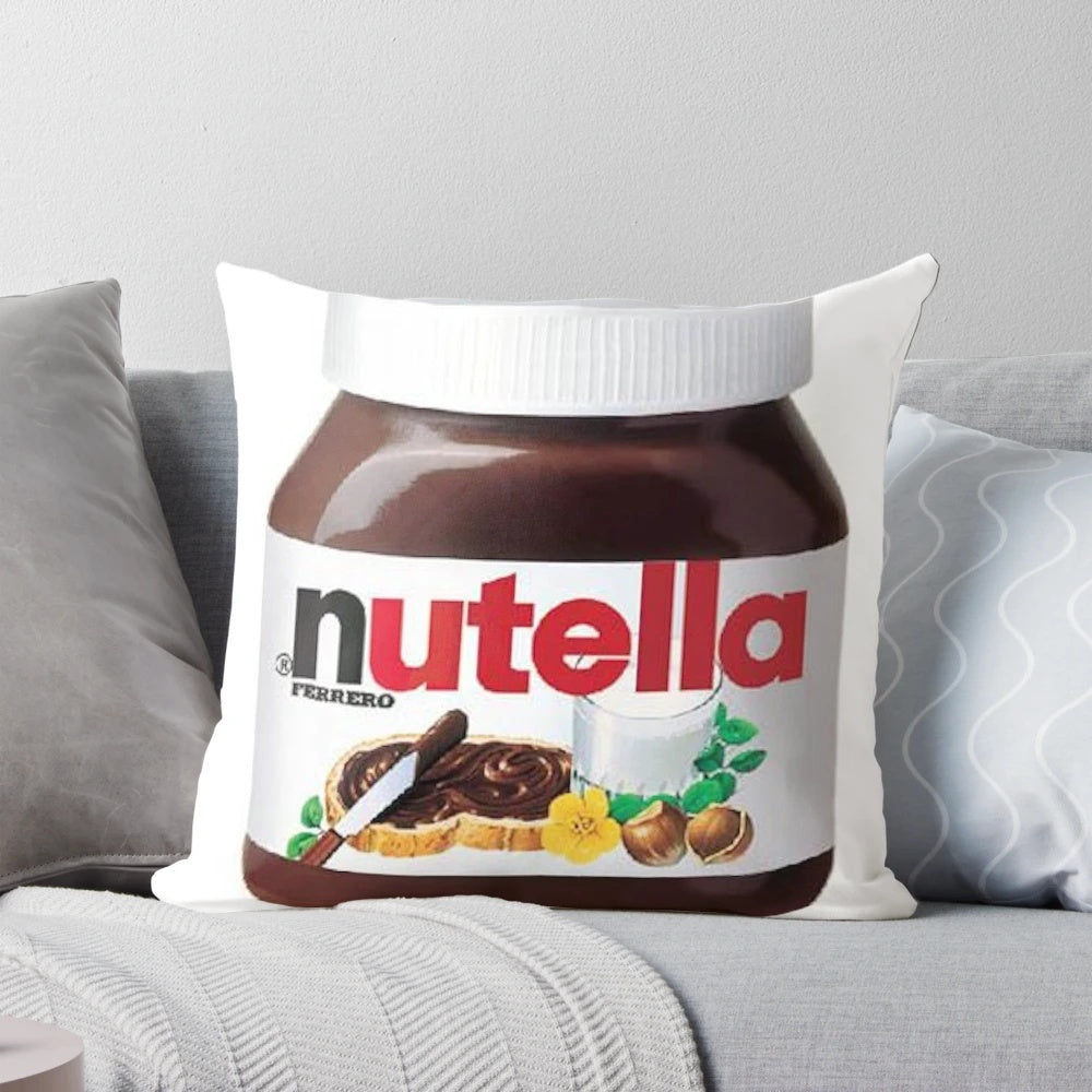 Vibrant and whimsical space-themed pillow with a playful Nutella-inspired design