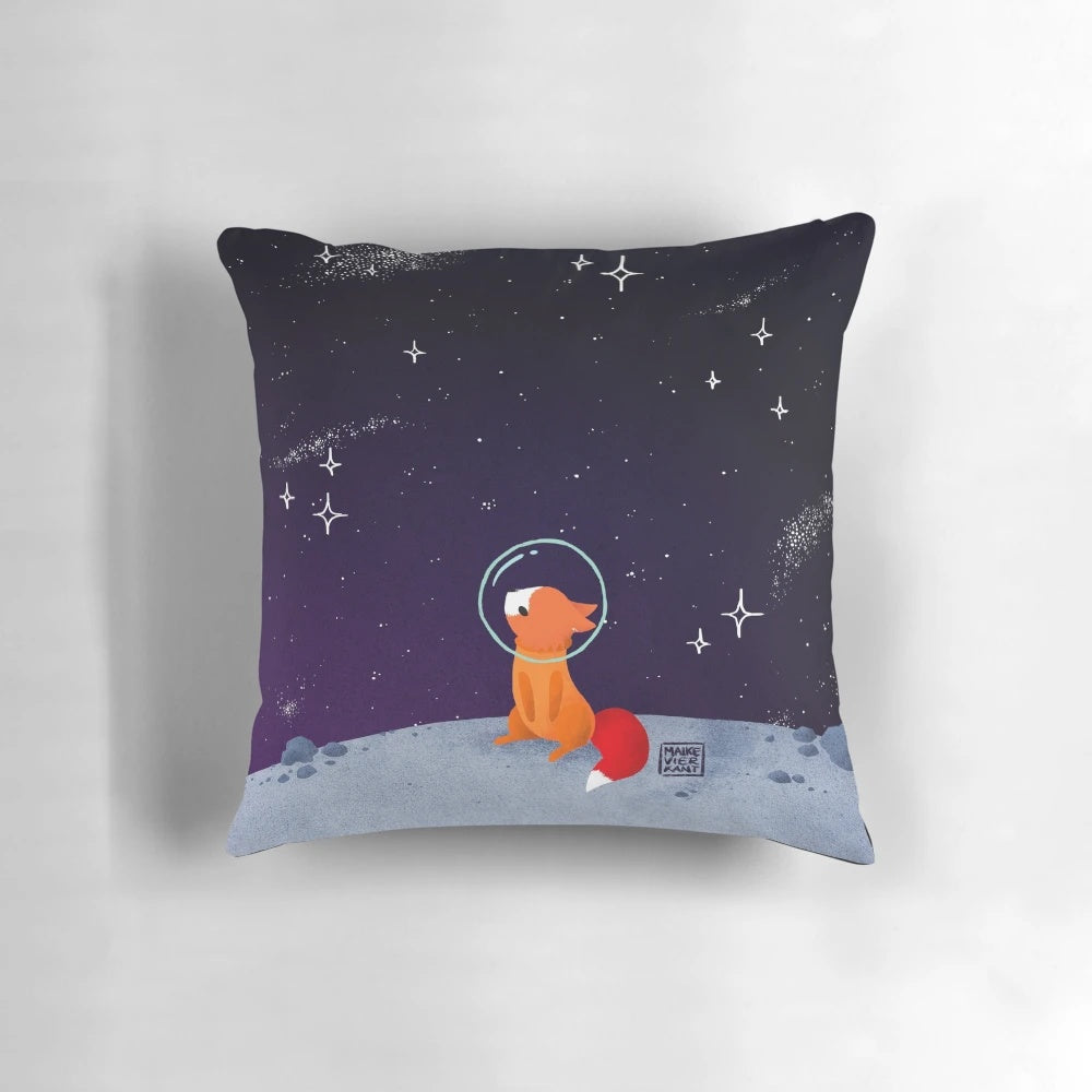 A cozy and whimsical pillow featuring a cute red fox in a spacesuit, floating among the stars in the galaxy.
