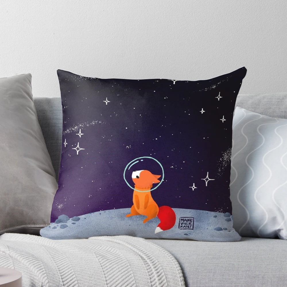 A cozy and whimsical pillow featuring a cute red fox in a spacesuit, floating among the stars in the galaxy.
