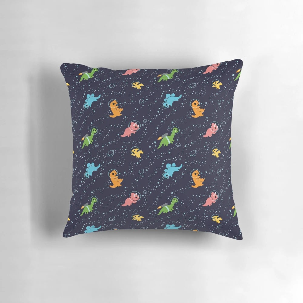 A vibrant pillow showcasing a playful pattern of dinosaurs soaring through a starry galaxy sky.