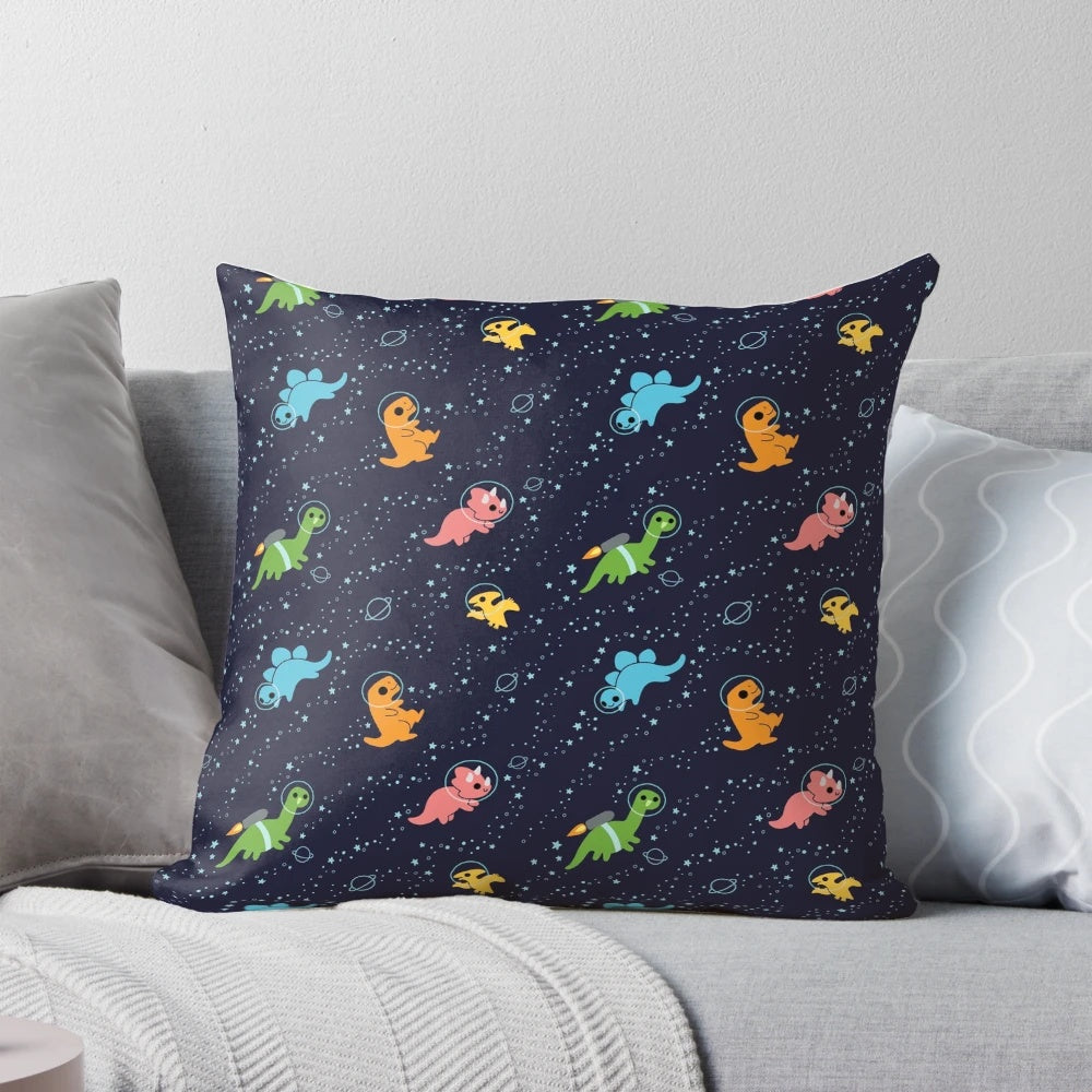 A vibrant pillow showcasing a playful pattern of dinosaurs soaring through a starry galaxy sky.