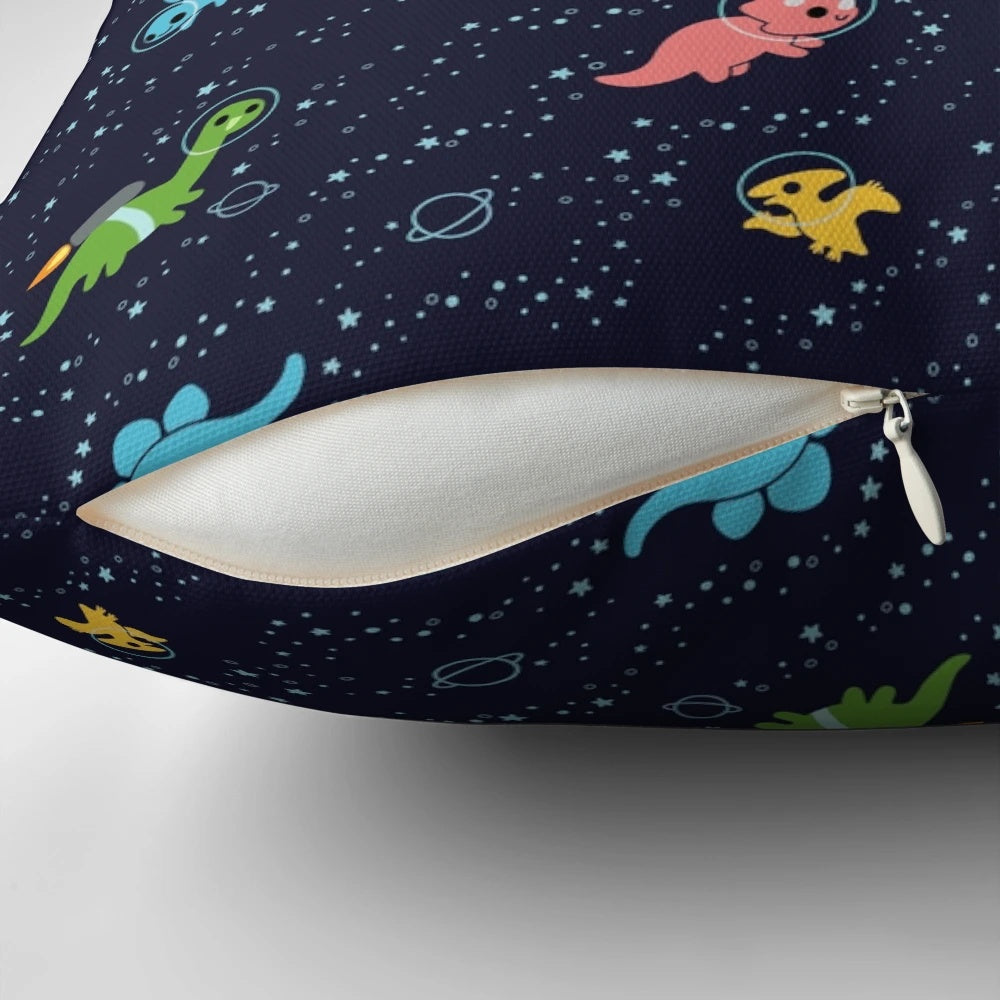 A vibrant pillow showcasing a playful pattern of dinosaurs soaring through a starry galaxy sky.