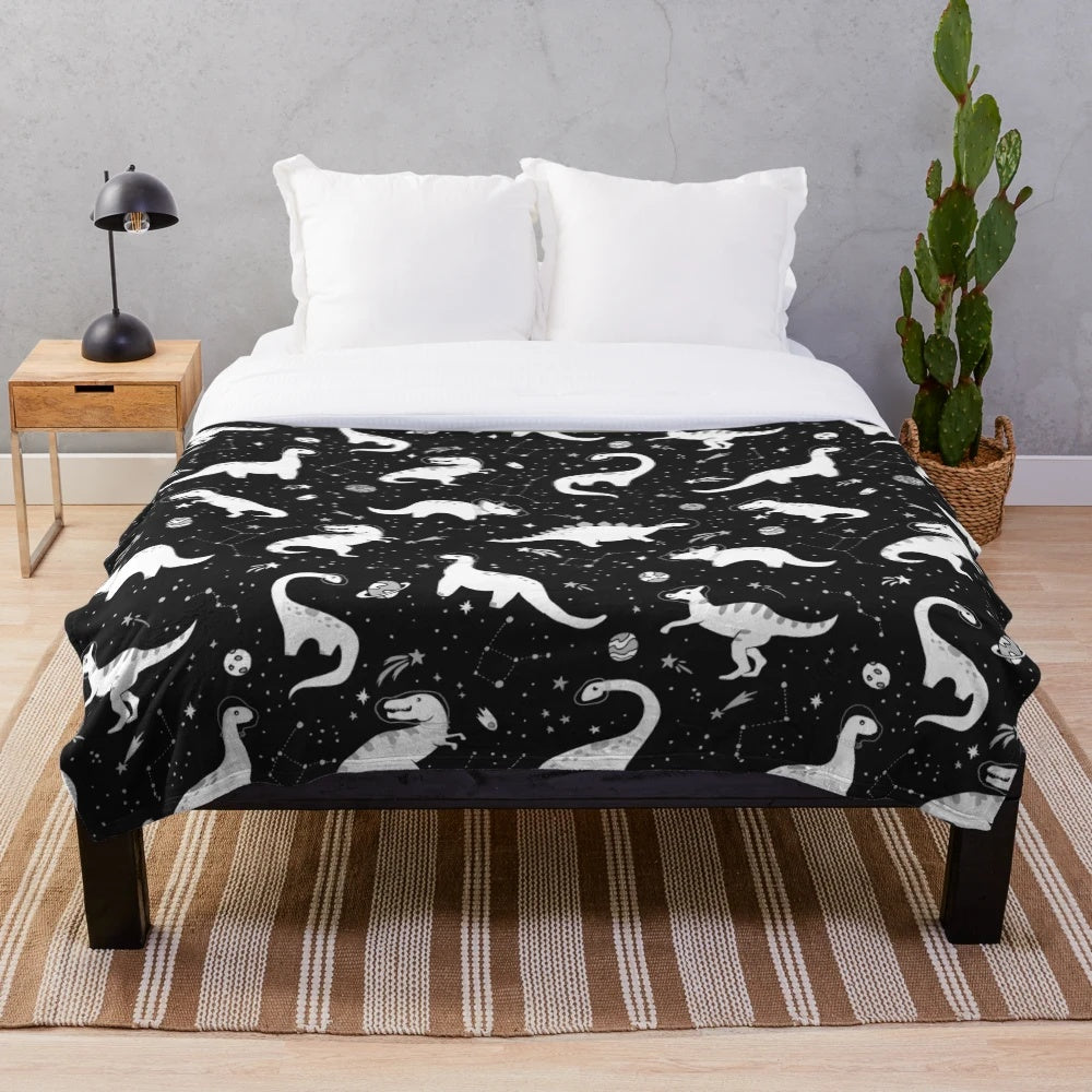 Space Dinosaurs Plush Blanket featuring a galaxy, planets, and cosmic elements