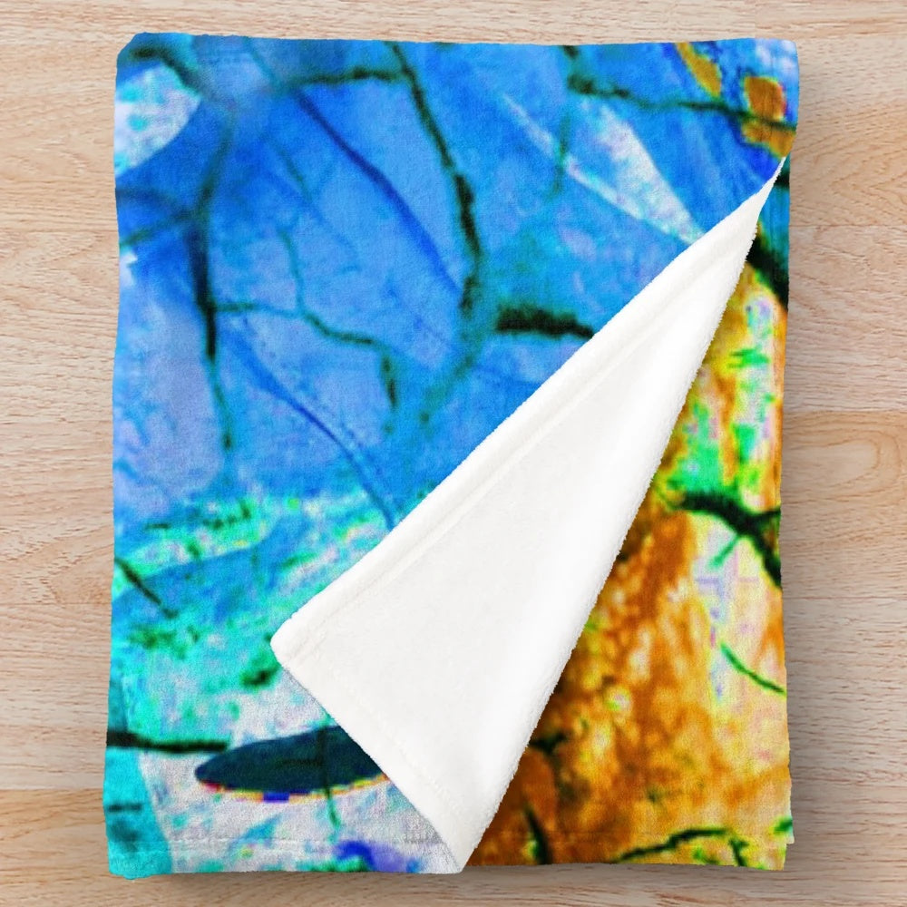 Astronaut plush blanket with abstract, disintegration design
