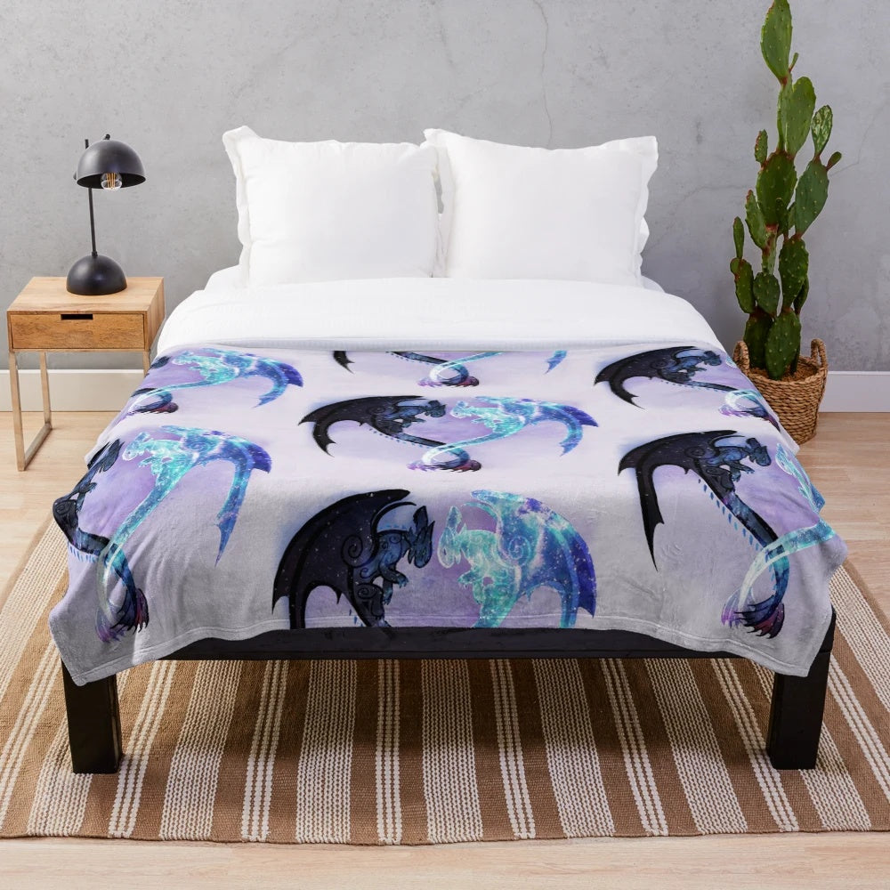 Toothless and Light Fury plush blanket featuring a cosmic, starry design