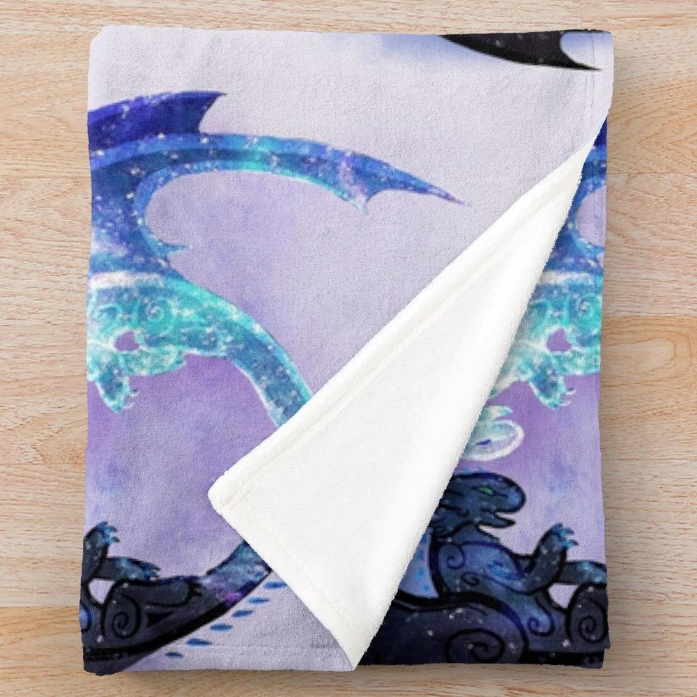 Toothless and Light Fury plush blanket featuring a cosmic, starry design