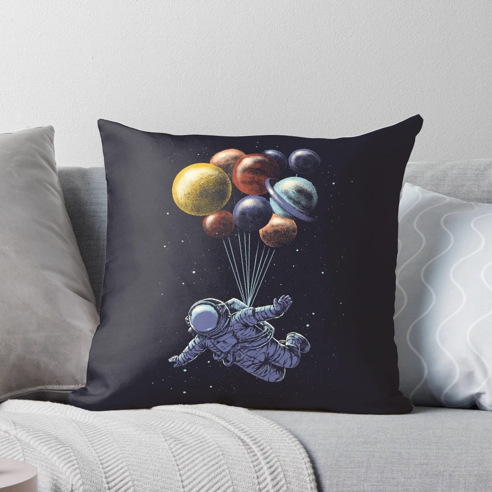 Vibrant pillow design featuring a surreal, floating landscape of planets, moons, and cosmic elements.