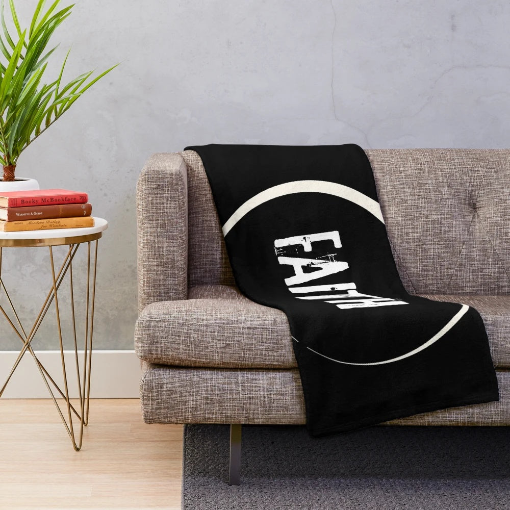 Cosmic eclipse illustration printed on a cozy plush blanket