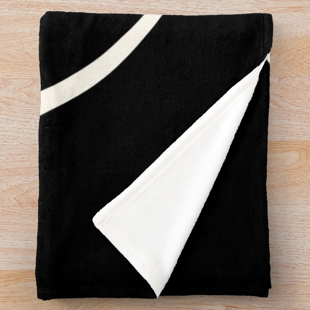 Cosmic eclipse illustration printed on a cozy plush blanket