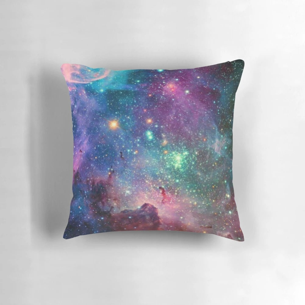 Galaxy-printed pillow with stars, planets, and cosmic elements