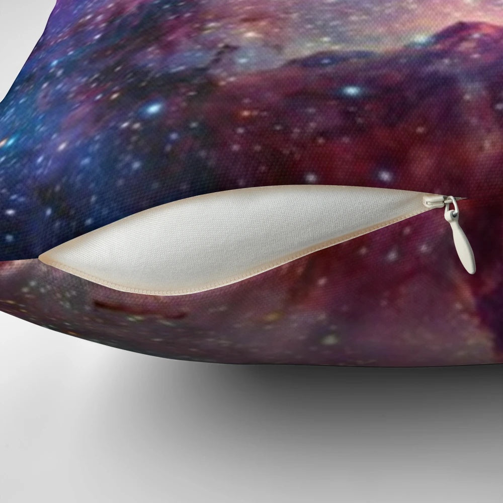 Galaxy-printed pillow with stars, planets, and cosmic elements