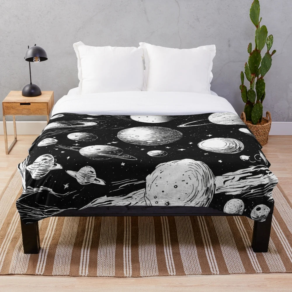 Plush blanket featuring a galaxy design