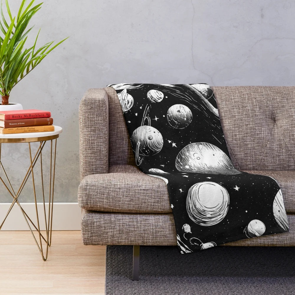 Plush blanket featuring a galaxy design