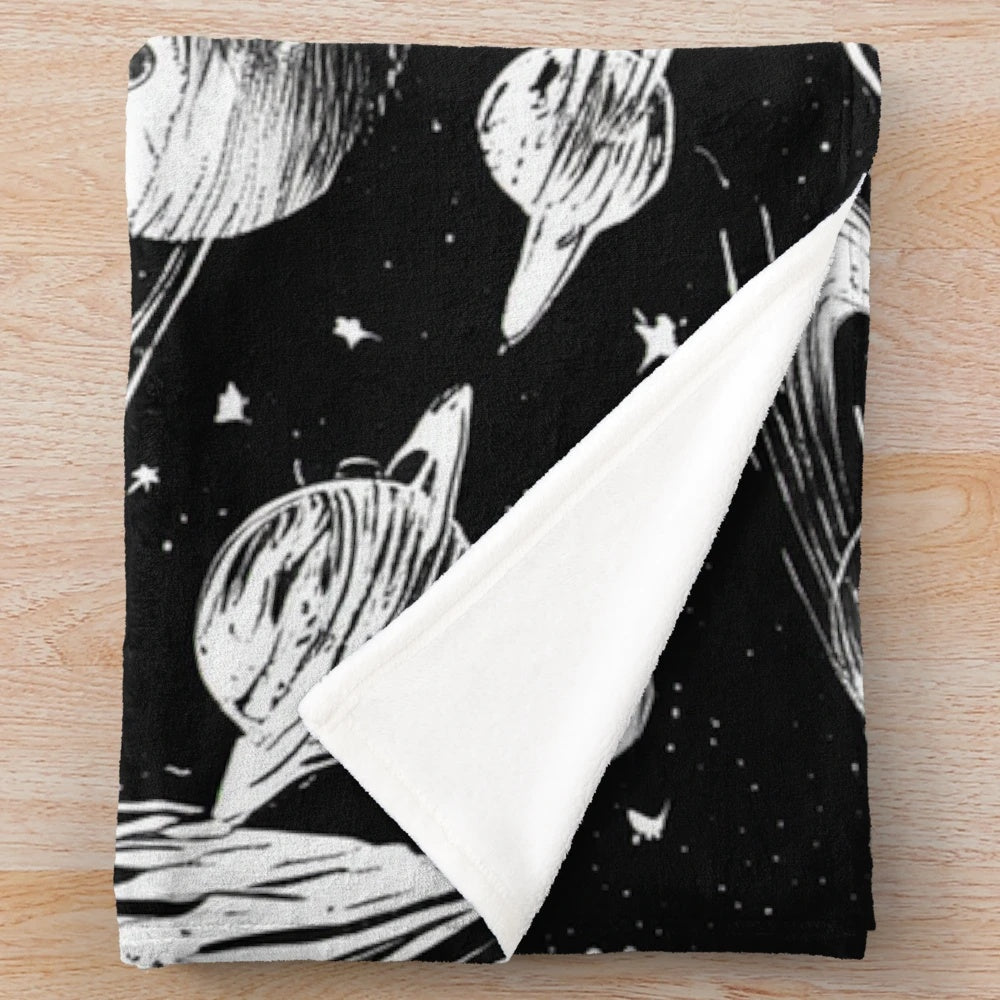 Plush blanket featuring a galaxy design