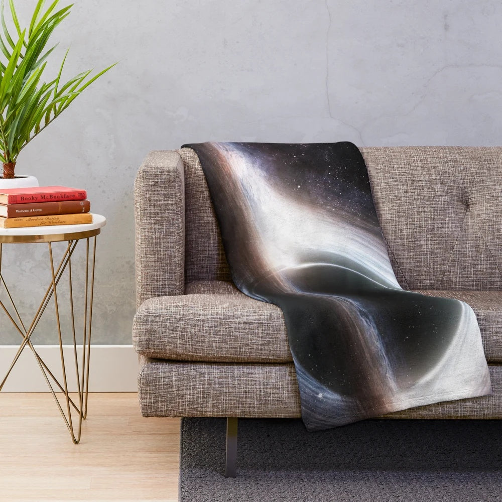 Gargantua Plush Blanket featuring a space and galaxy design