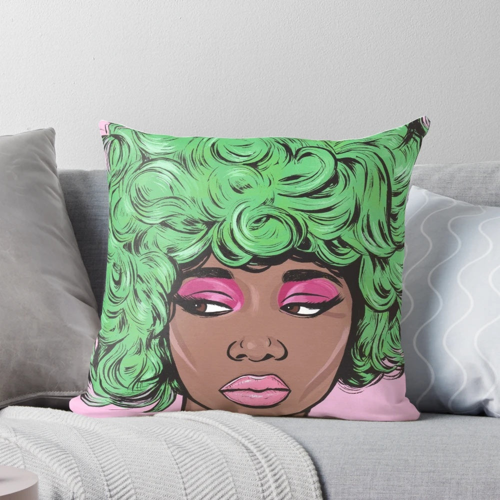 A vibrant pillow featuring a green-haired kawaii comic girl in a cosmic goddess style, created by a Vermont artist.
