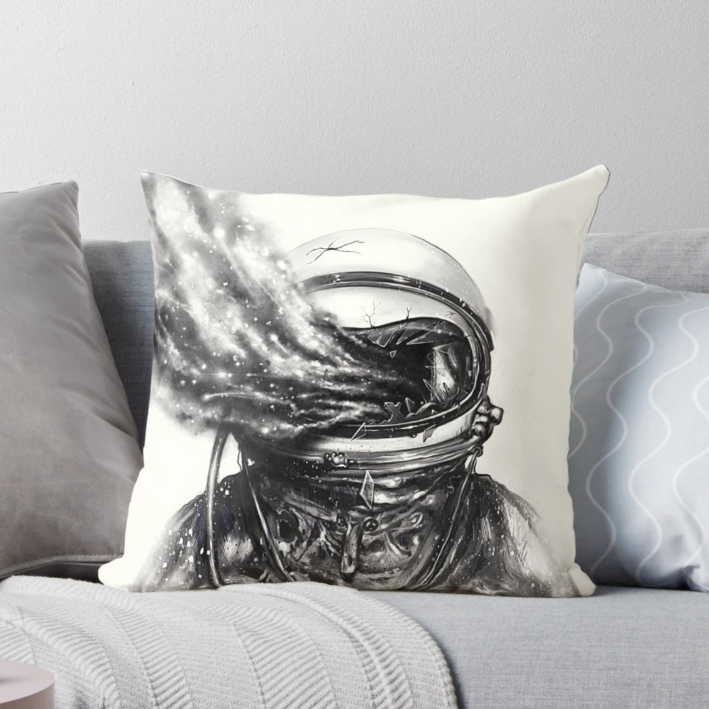 A black and white graphic design pillow featuring an abstract, surrealist depiction of an astronaut, space, stars, and cosmic elements.