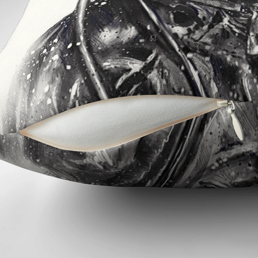 A black and white graphic design pillow featuring an abstract, surrealist depiction of an astronaut, space, stars, and cosmic elements.