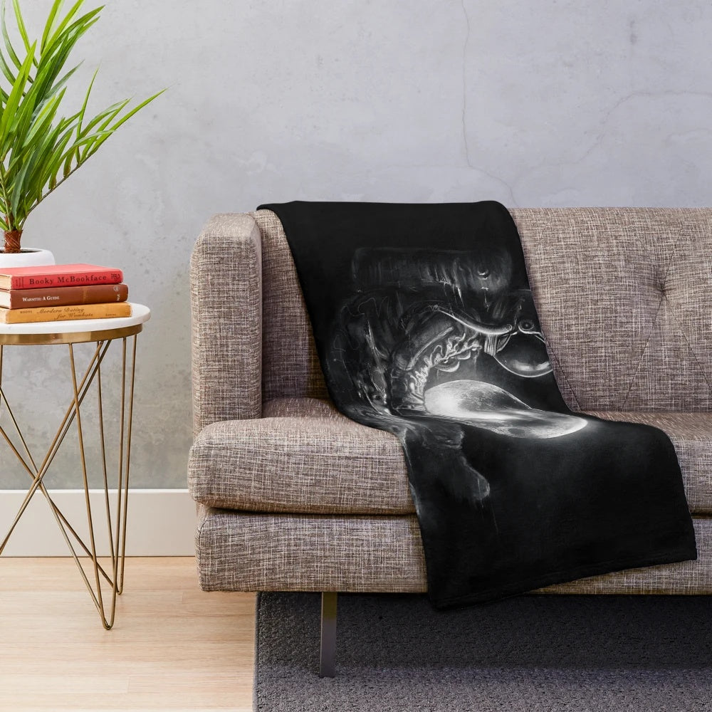 Plush blanket with cosmic moon and space design