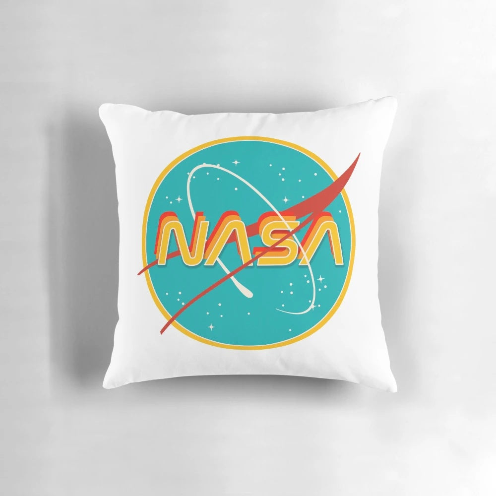 Vintage-inspired NASA retro pillow featuring a vibrant yellow and warm-toned galaxy design