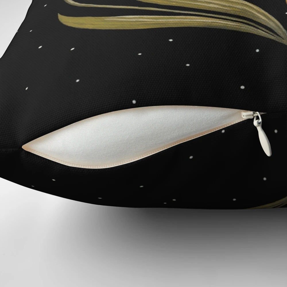 A Pillow with a beautiful night sky design featuring a moth, butterflies, and flowers under three moons