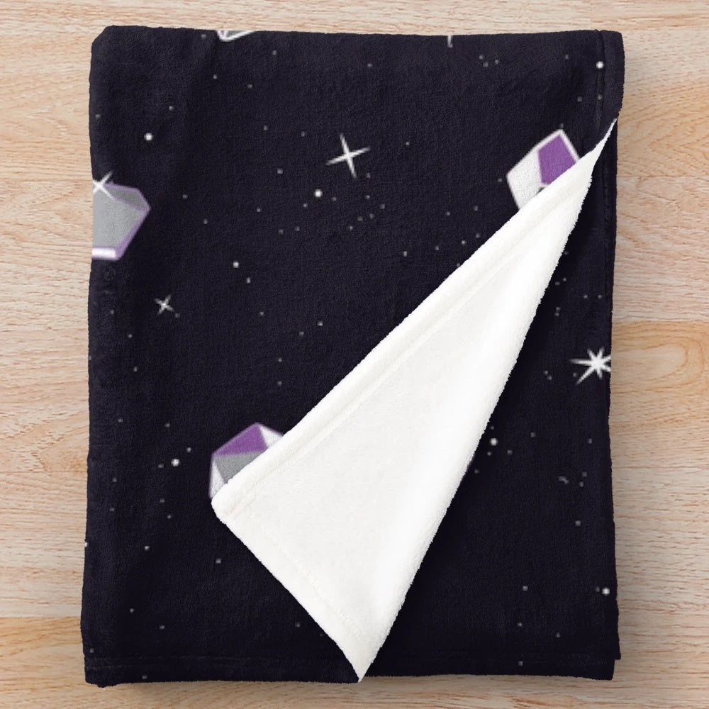 Plush purple and black blanket with polyhedral dice pattern, ideal for dice enthusiasts and TTRPG fans