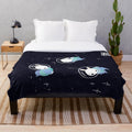 Colorful digital illustration of cute space bunnies on a plush blanket