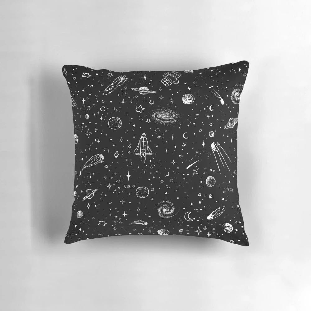 A decorative space-themed pillow with a vibrant cosmic design, featuring planets, stars, and galaxies.