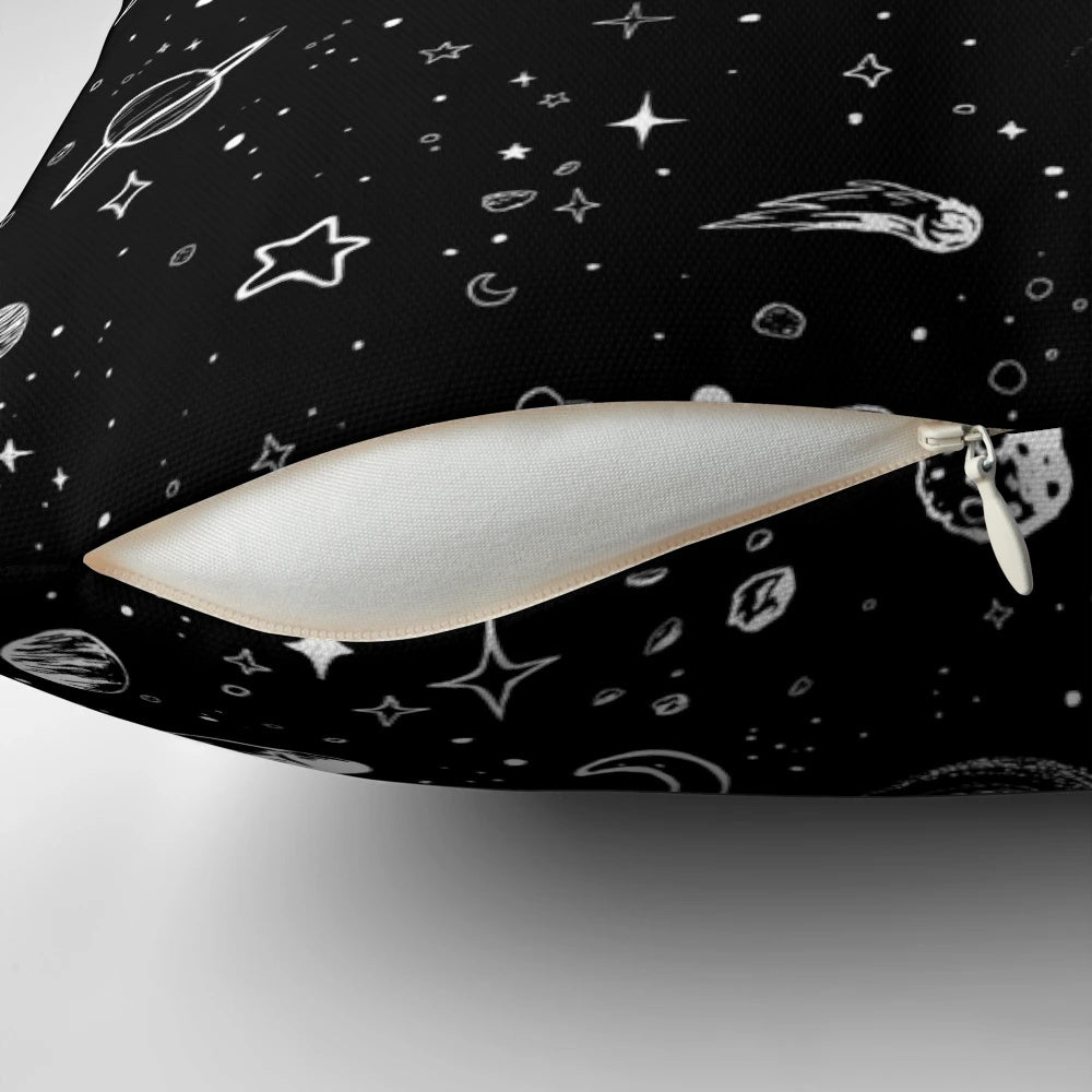 A decorative space-themed pillow with a vibrant cosmic design, featuring planets, stars, and galaxies.