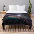 Plush blanket featuring a space shark with glowing teeth and stars in the background