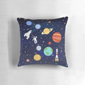A colorful and whimsical space-themed pillow with illustrations of rockets, stars, planets, and the cosmos.