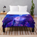 Colorful plush blanket with cosmic star and abstract cultural pattern design