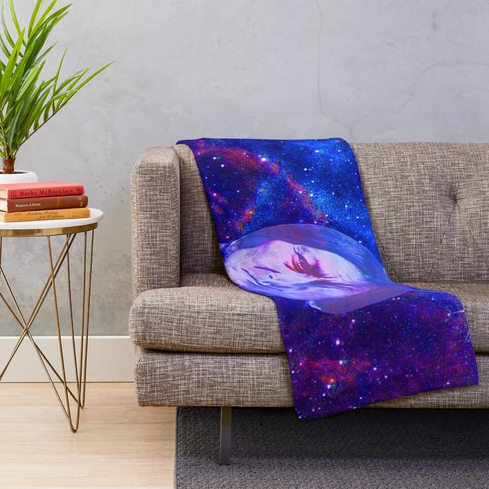 Colorful plush blanket with cosmic star and abstract cultural pattern design
