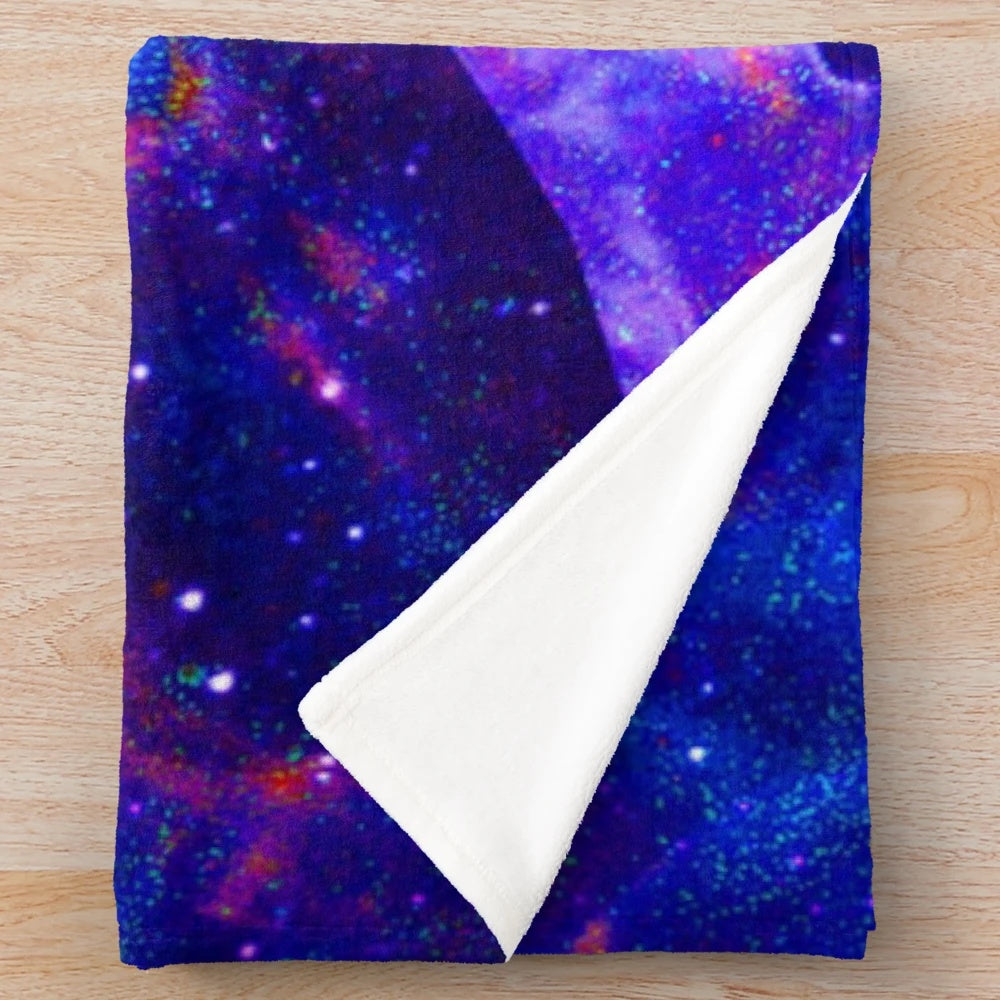 Colorful plush blanket with cosmic star and abstract cultural pattern design
