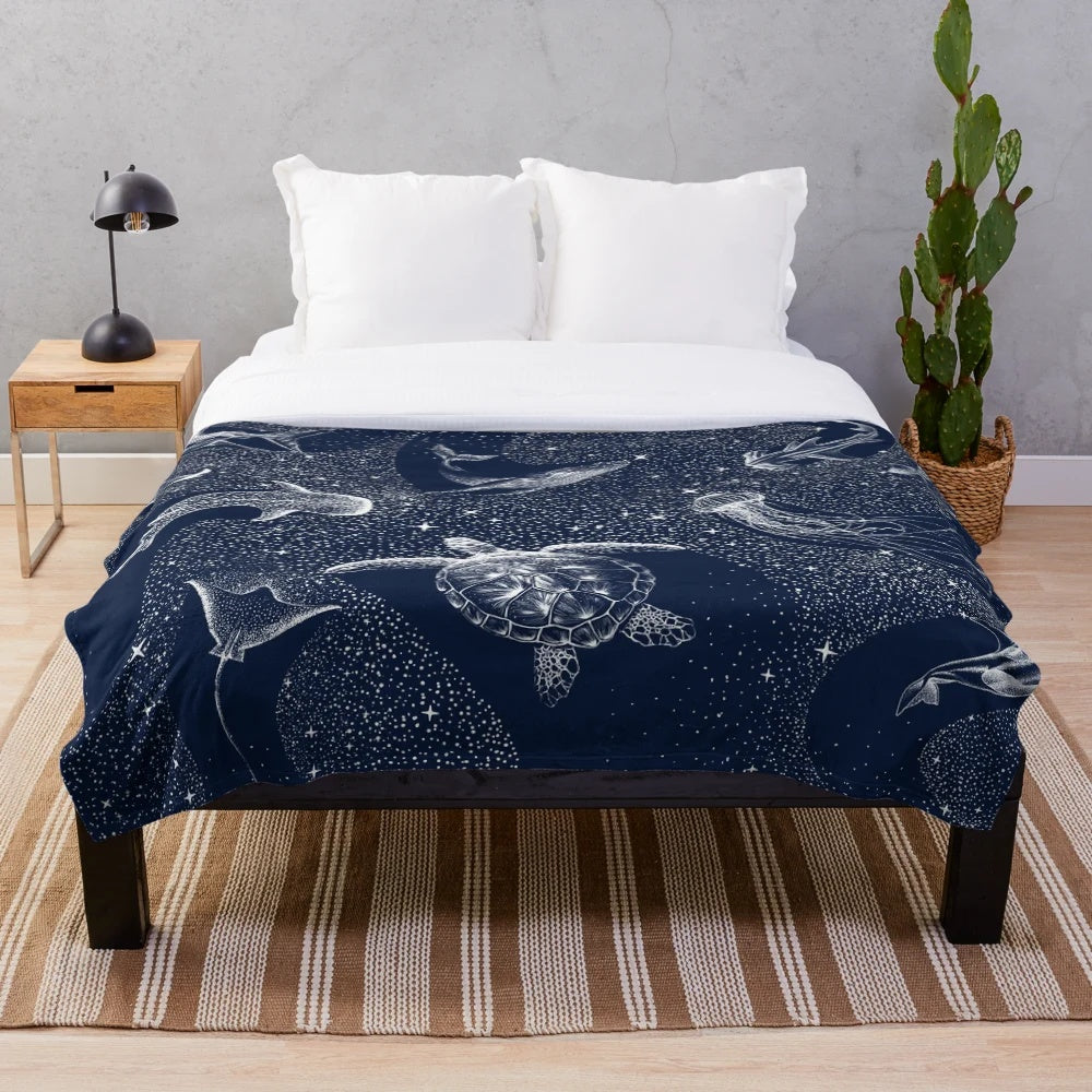 Cosmic Underwater Plush Blanket featuring marine life and galaxy design