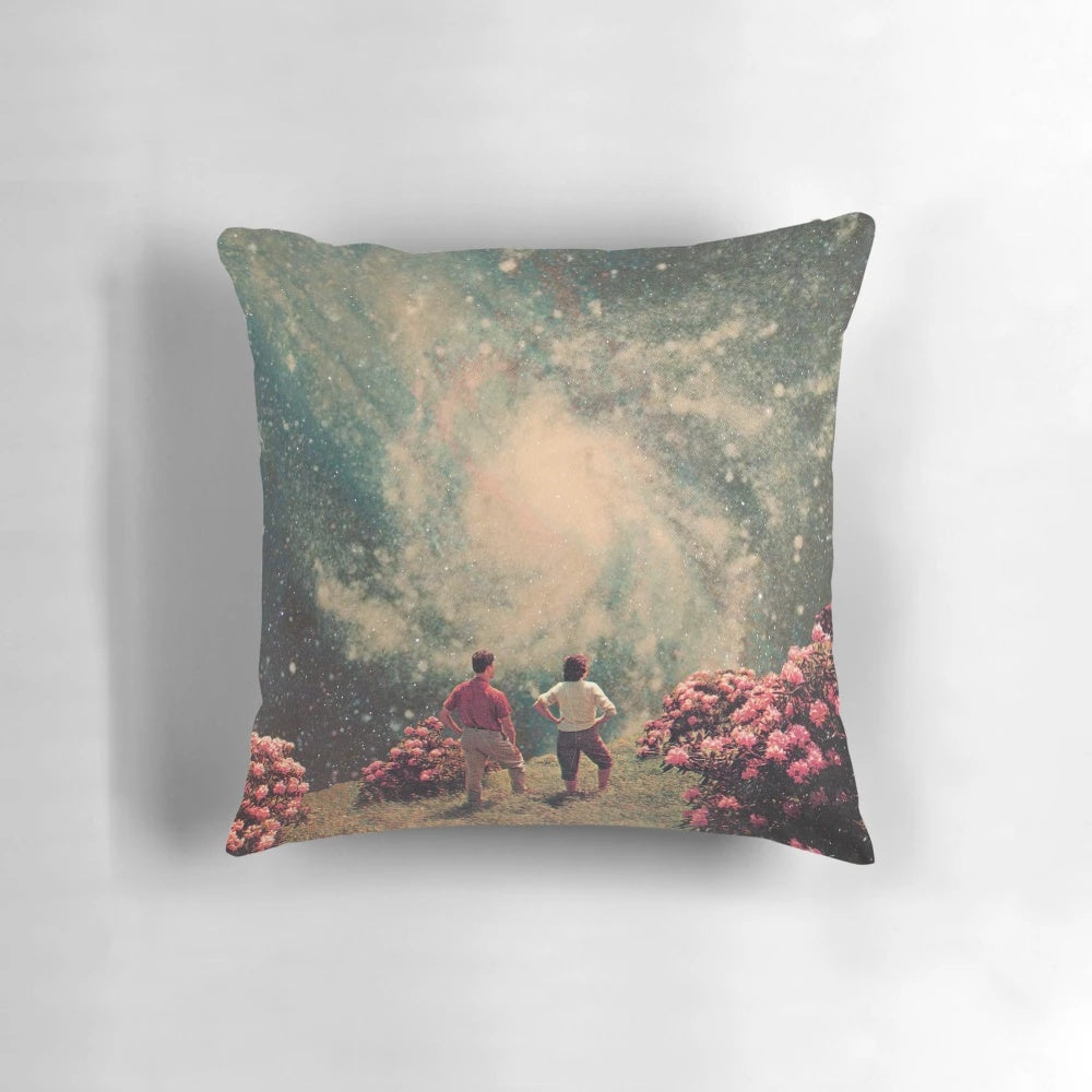 Vintage-inspired pillow featuring a surreal, cosmic landscape design with a couple embracing under the stars