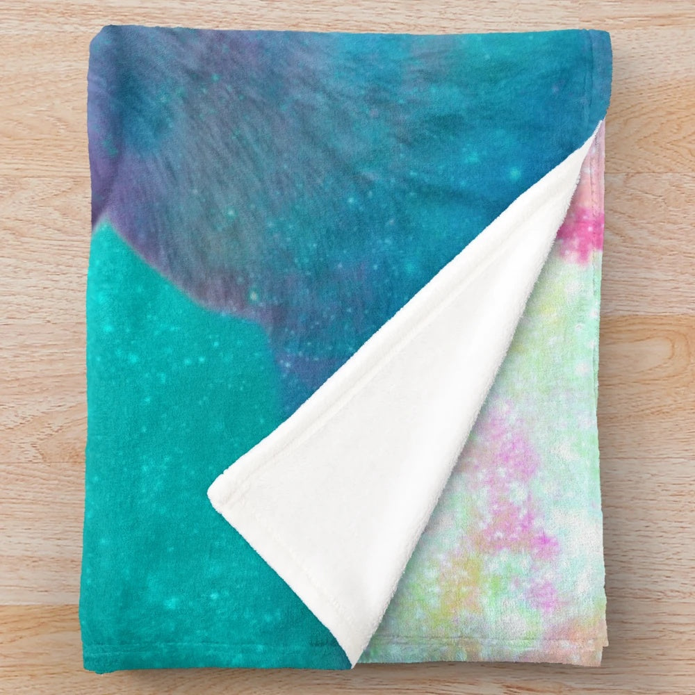 Plush blanket with cosmic wolf design in surreal dreamscape