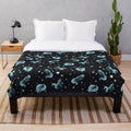 Cosmic wolf plush blanket with galaxy print pattern