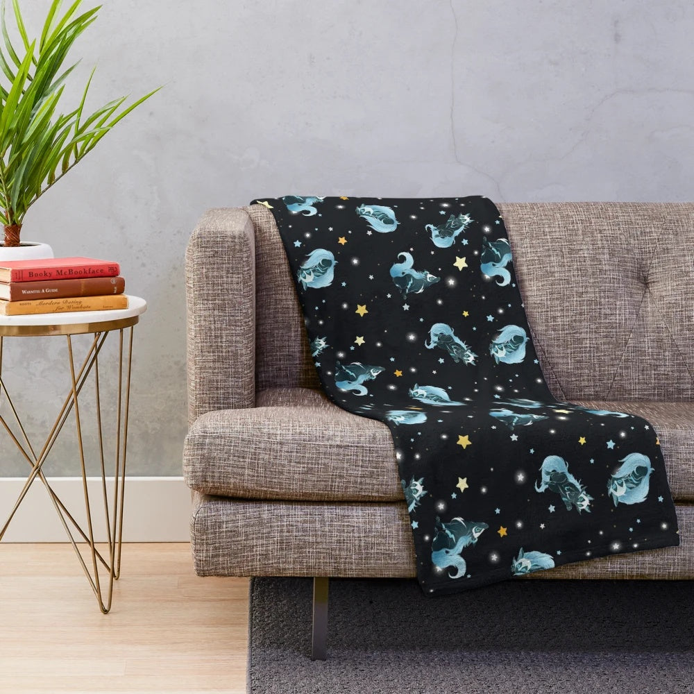 Cosmic wolf plush blanket with galaxy print pattern