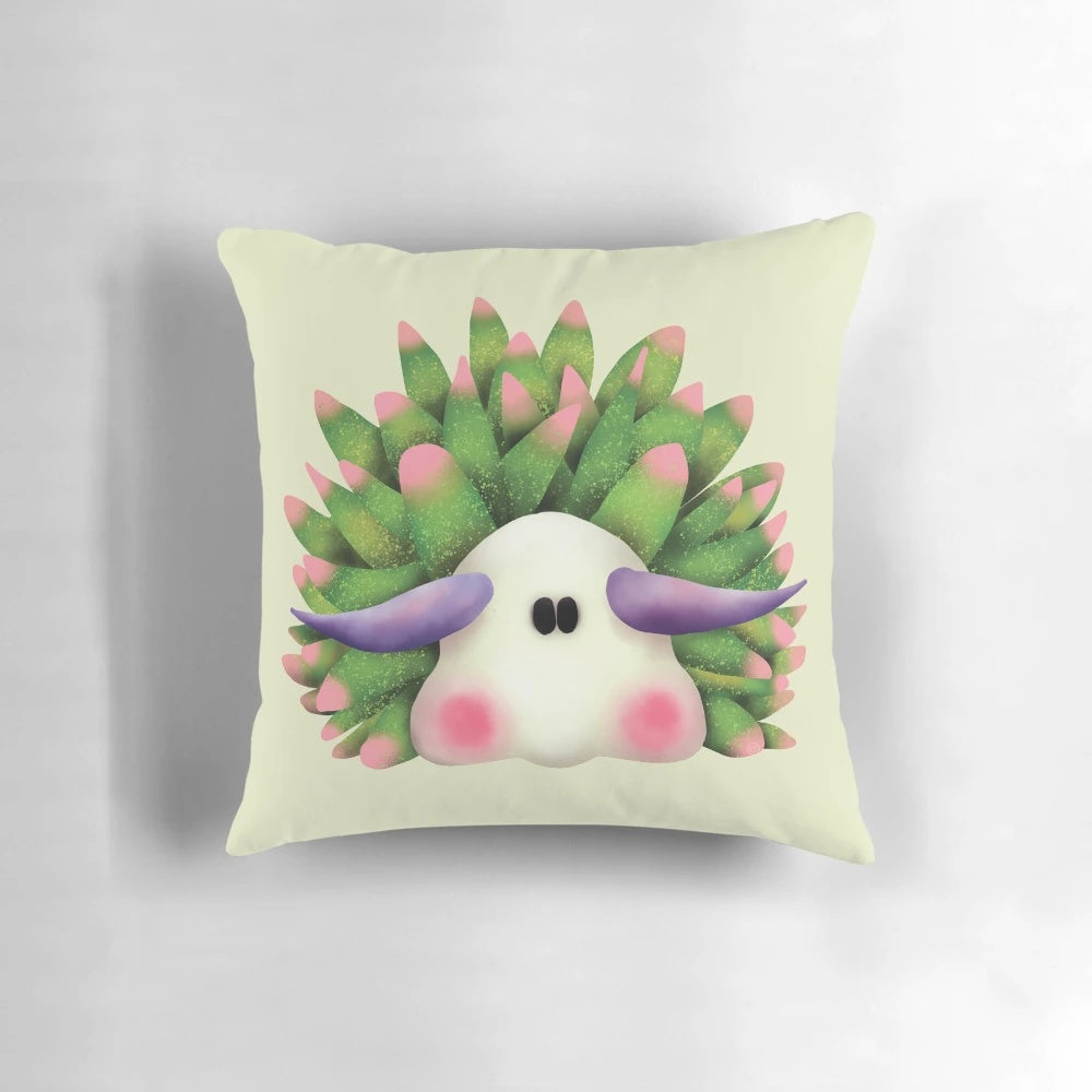 Vibrant green and pink nudibranch, also known as the leaf sheep sea slug, on a soft pillow