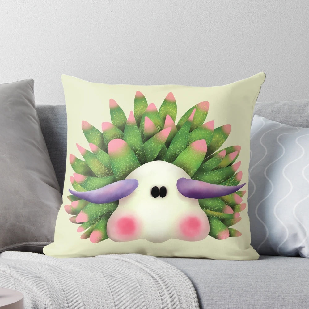 Vibrant green and pink nudibranch, also known as the leaf sheep sea slug, on a soft pillow