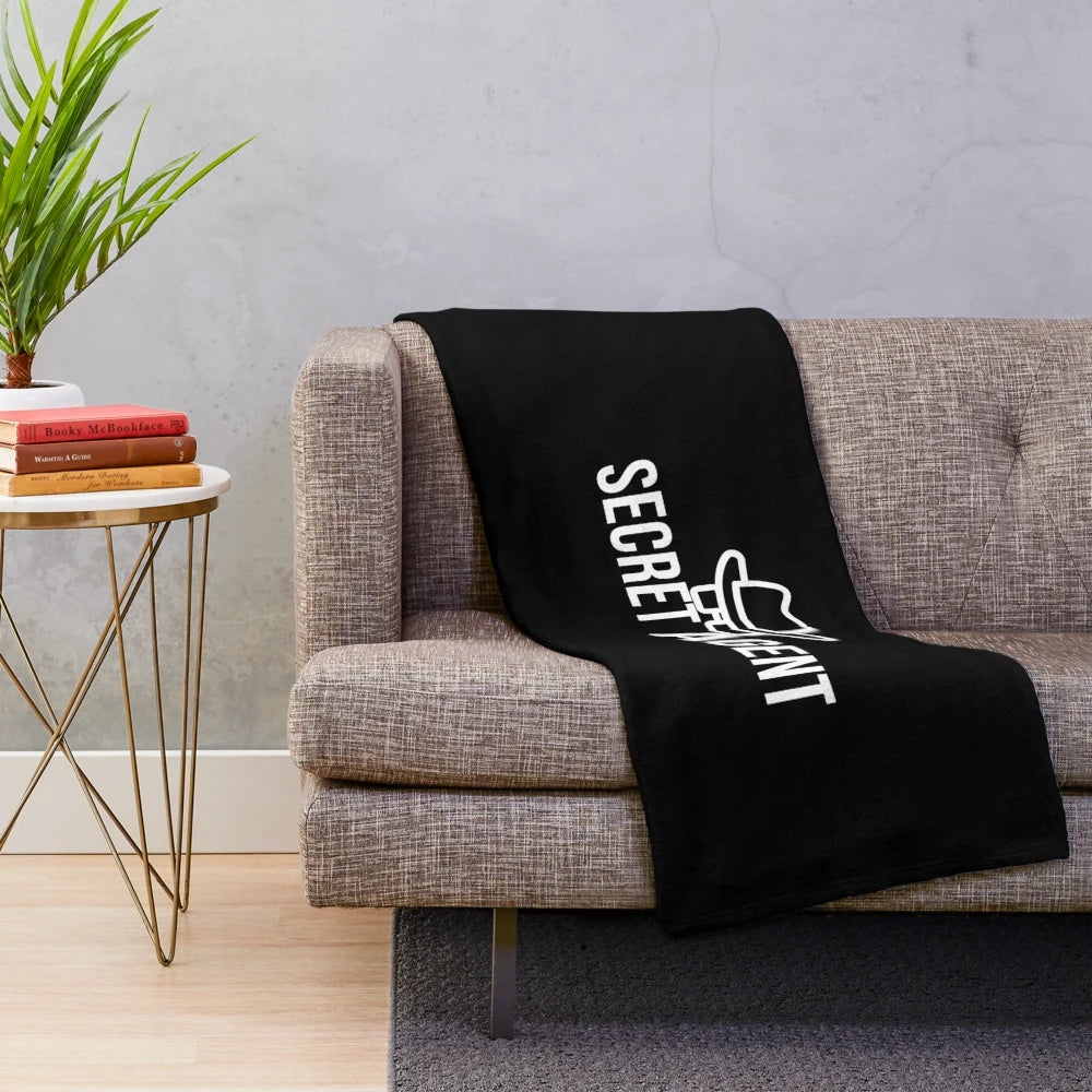 Plush blanket featuring covert operations and detective design