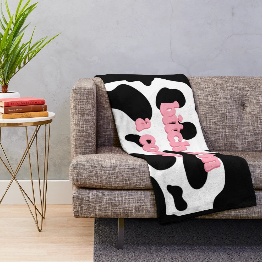 Cozy cow print plush blanket