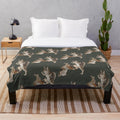 Coyote and hare plush blanket featuring animal musicians playing fiddle and harmonica