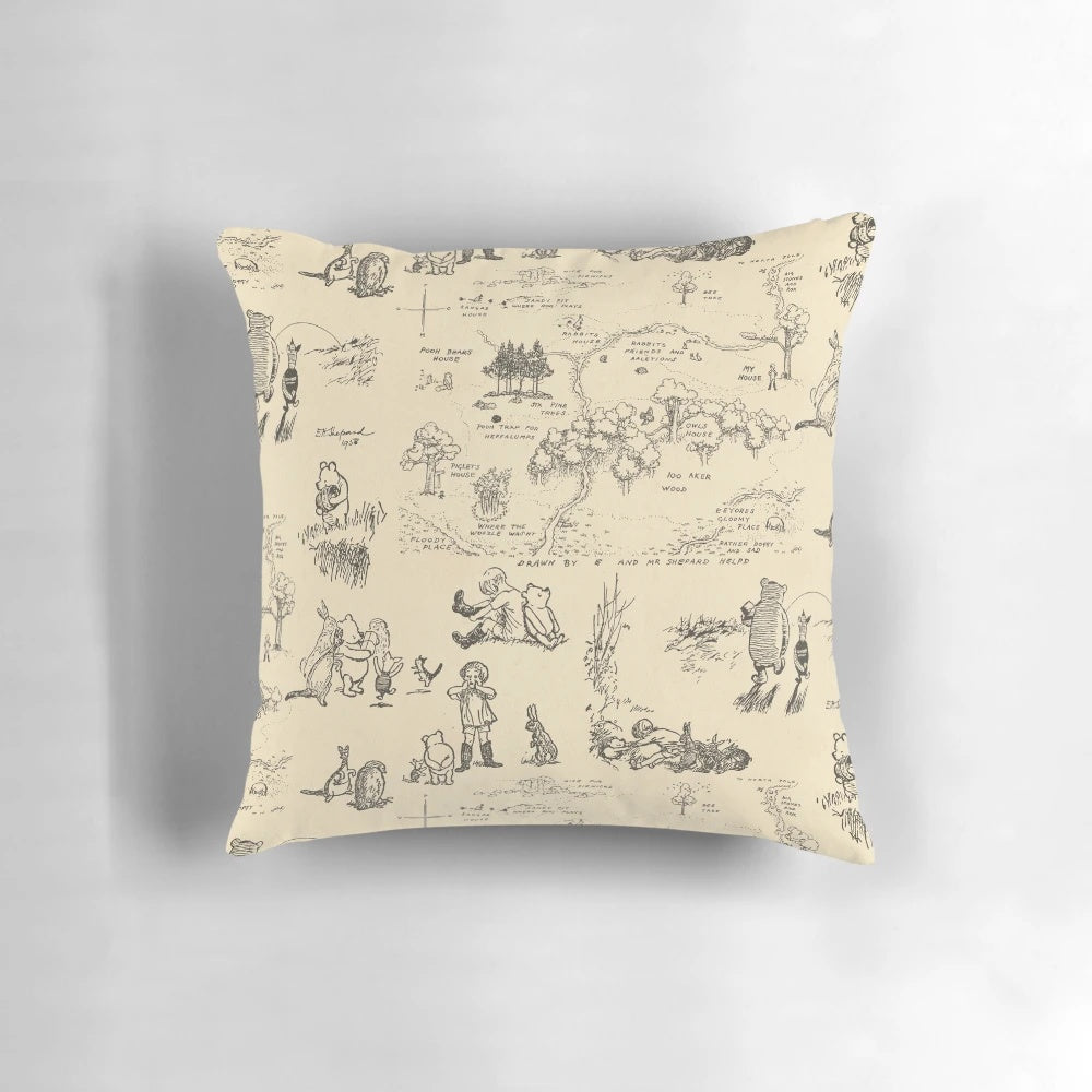 Cream-colored 100 Aker Wood Winnie the Pooh inspired pillow featuring characters and sketches from the beloved children's books.