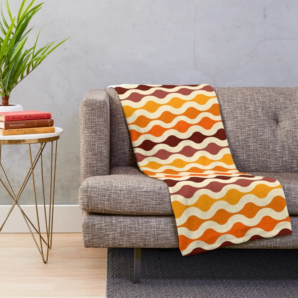 Soft and plush blanket with a vibrant 70s inspired groovy pattern